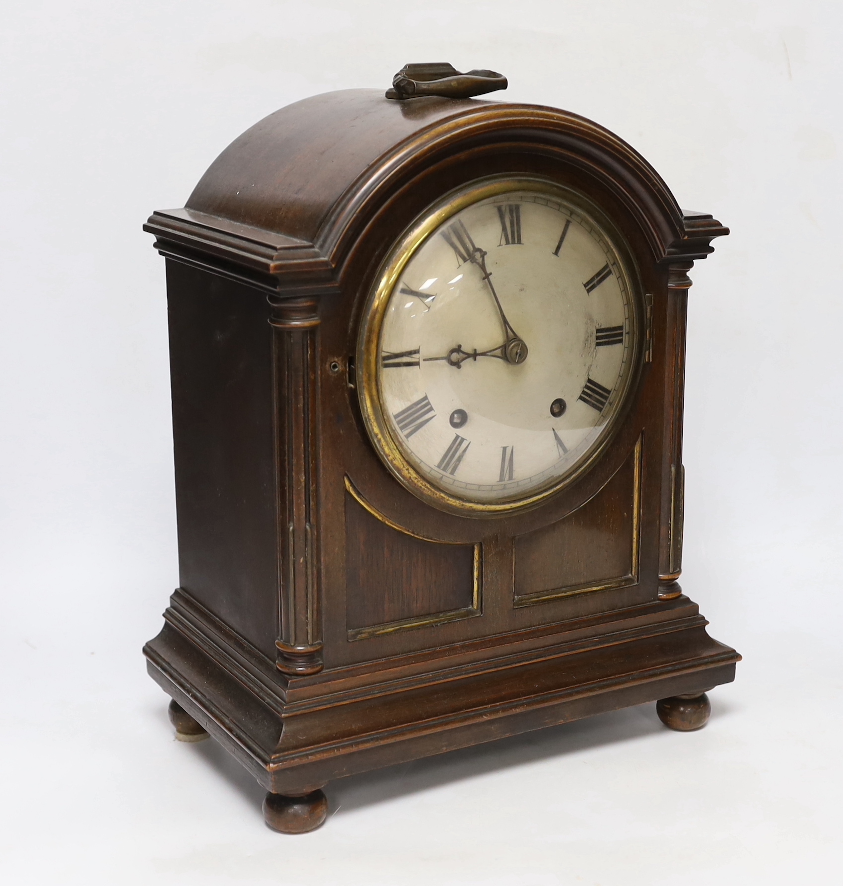 An Edwardian mantel clock, with two train movement, striking and chiming on five coiled gongs, 35cm excluding handle